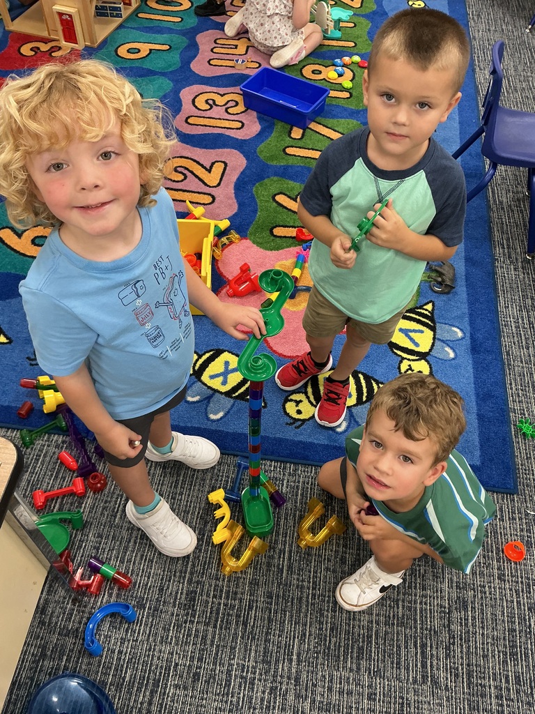 While it looks like simple fun, building with blocks and playing pretend help our students master math, build vocabulary, and learn to cooperate with friends.