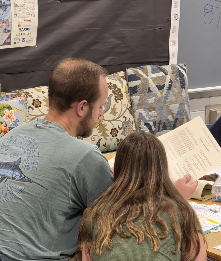 Ms. Ledford hosted an after-hours session for SES gifted program parents to cover the curriculum, answer questions, and navigate their children's reports.