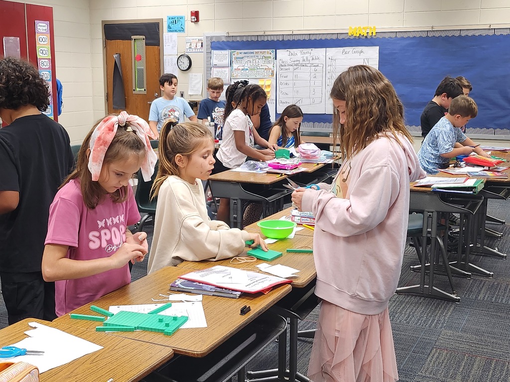 3rd graders make base ten robots