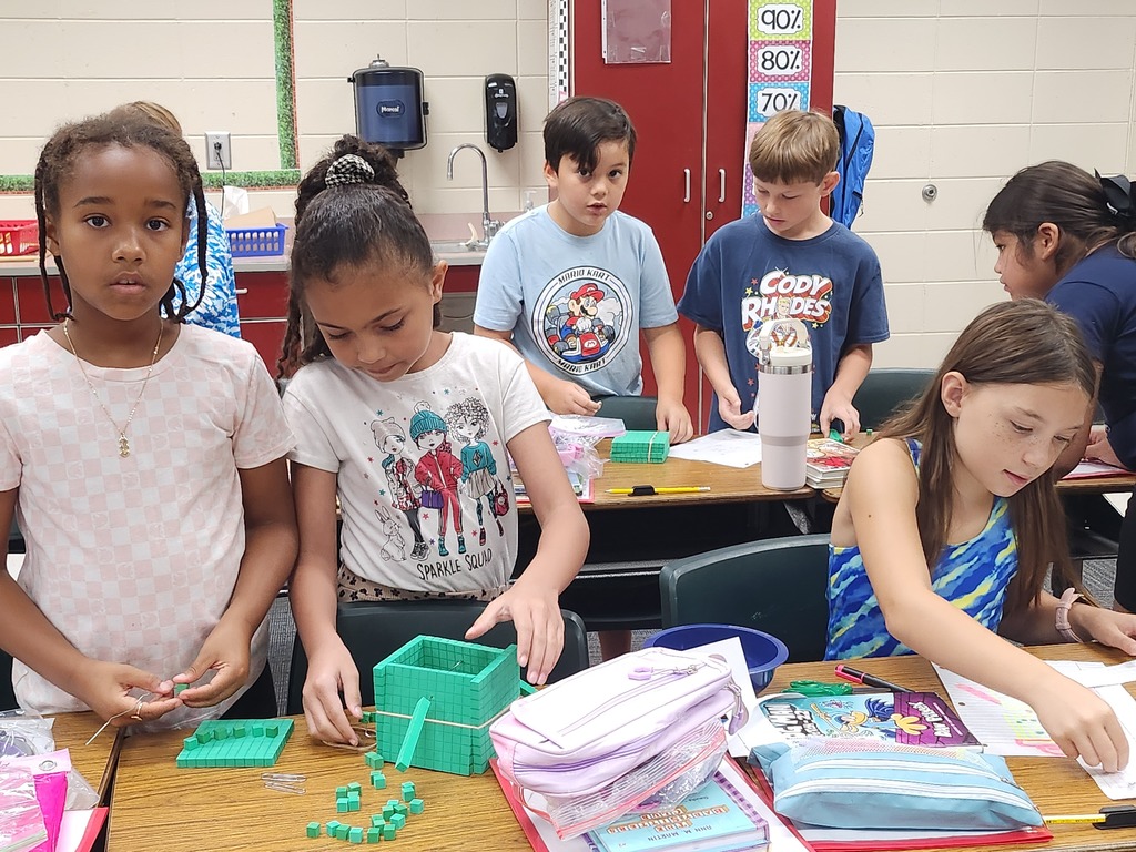 3rd graders make base ten robots