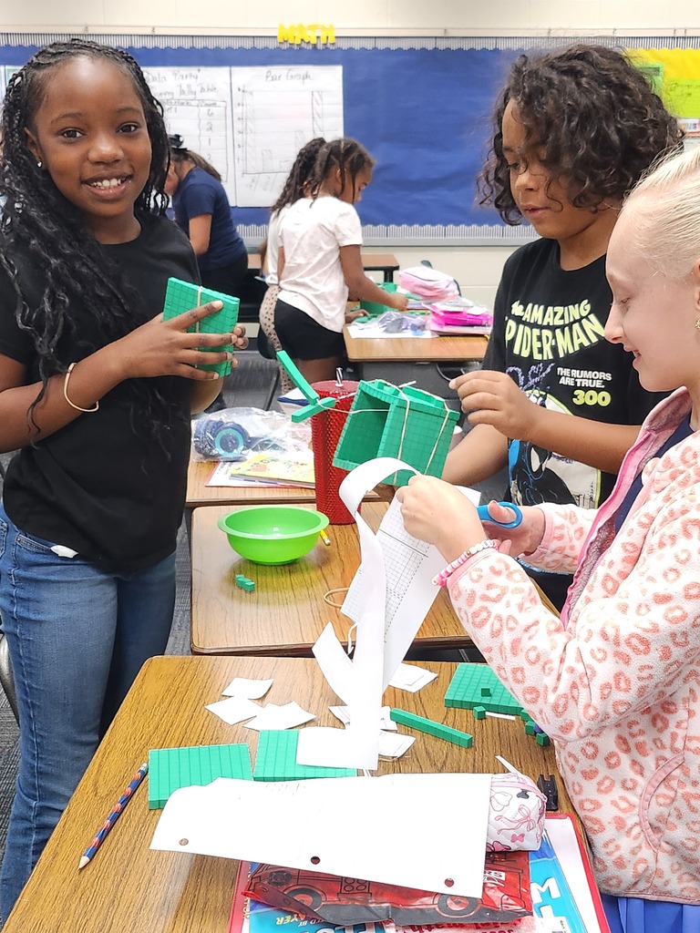 3rd graders make base ten robots