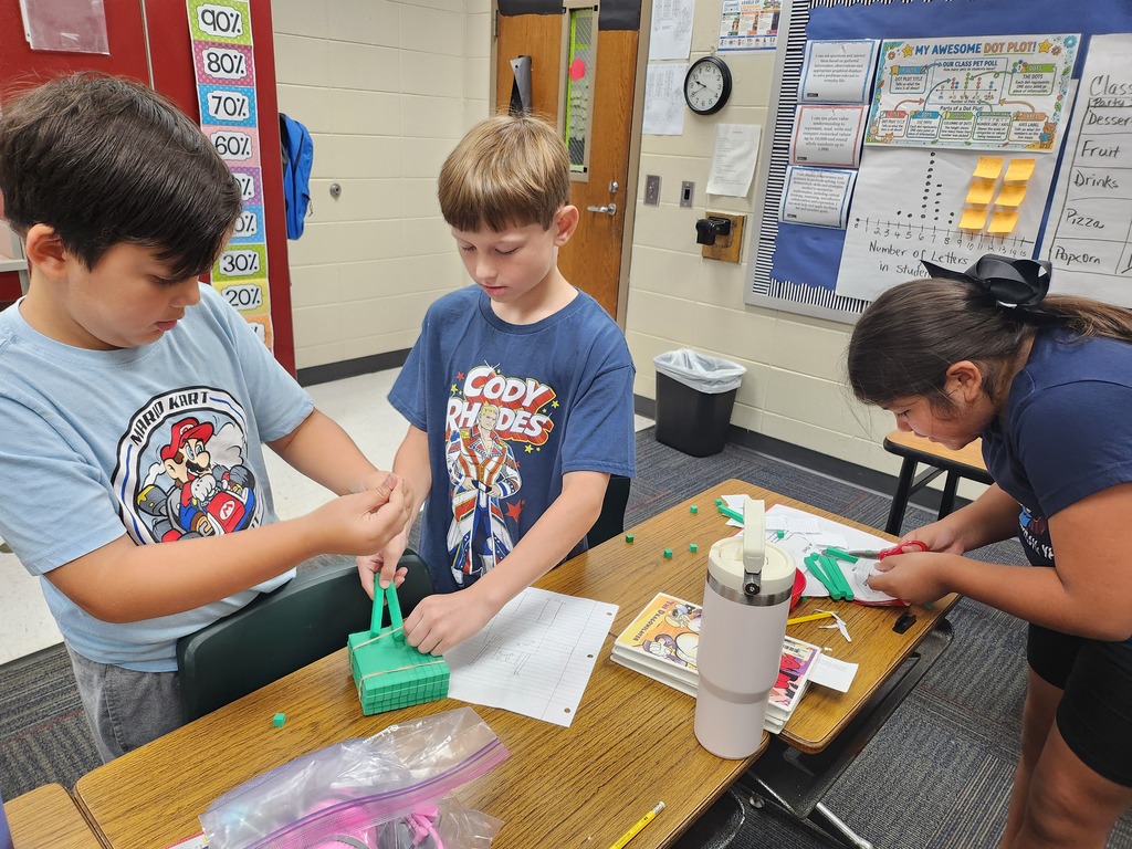 3rd graders make base ten robots