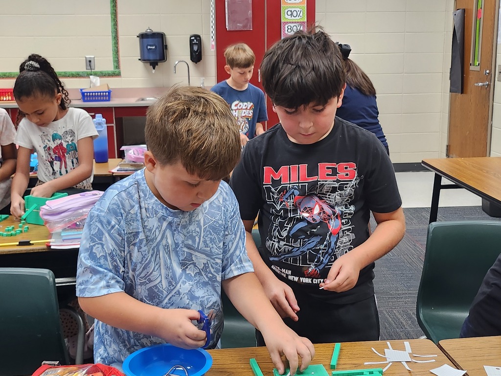 3rd graders make base ten robots