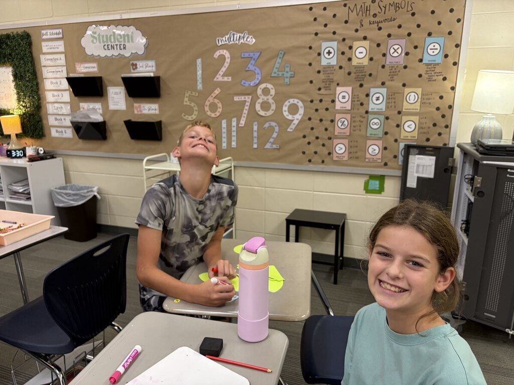 Students making encouraging notes for teachers