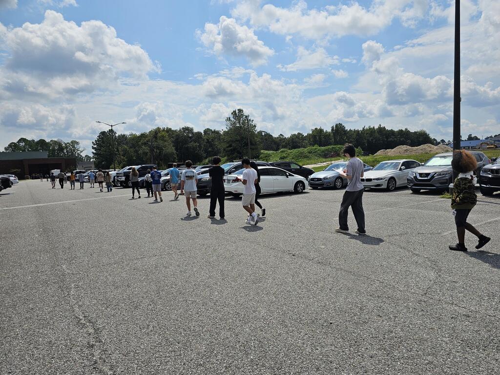 AP Environmental Students studying the biodiversity of cars in the parking lot