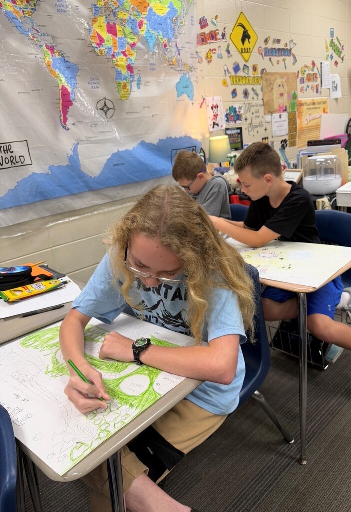 Students in 6th grade creating maps