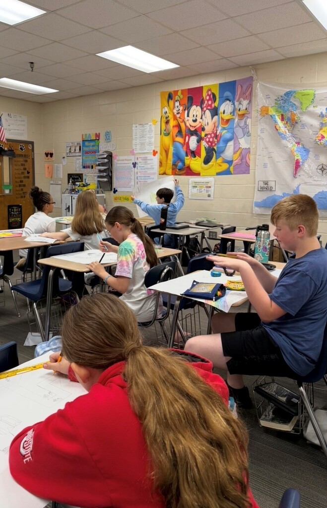 Students in 6th grade creating maps
