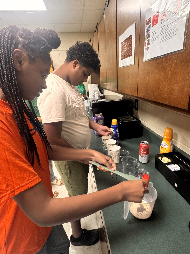 students making coffee