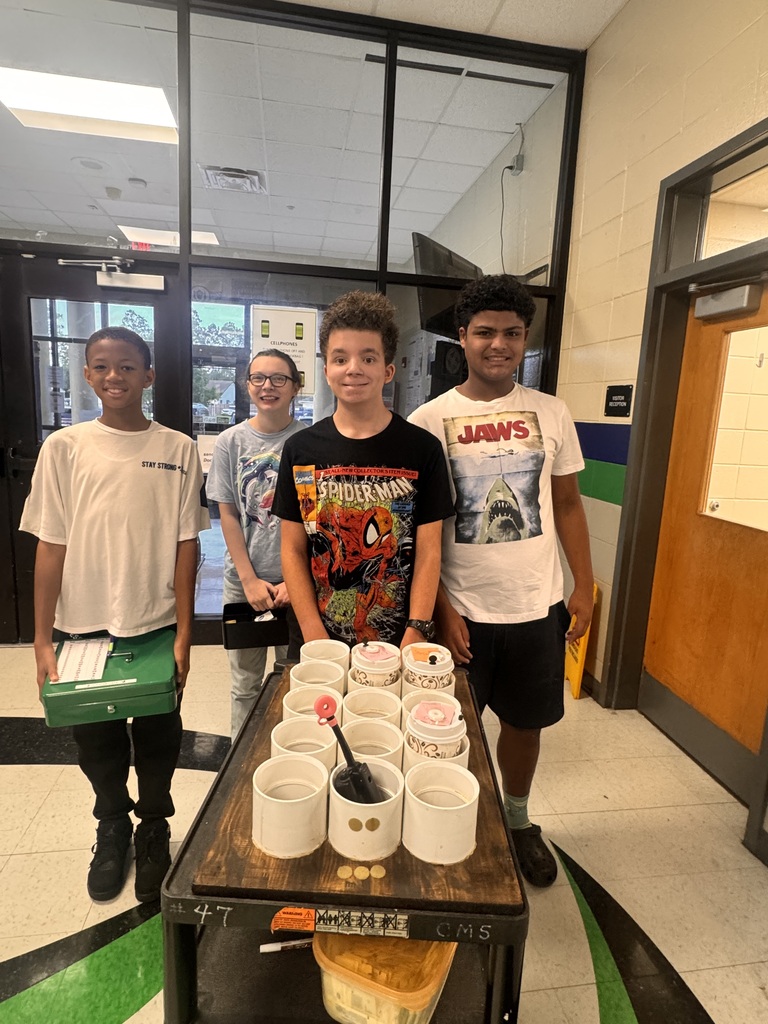 students serving coffee