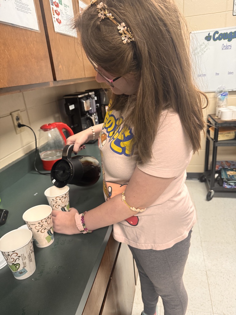 student making coffee