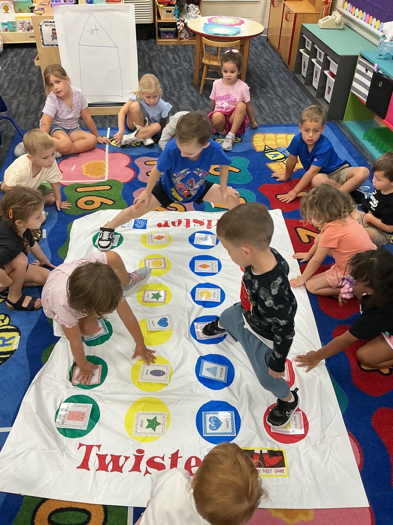 Students playing shape twister