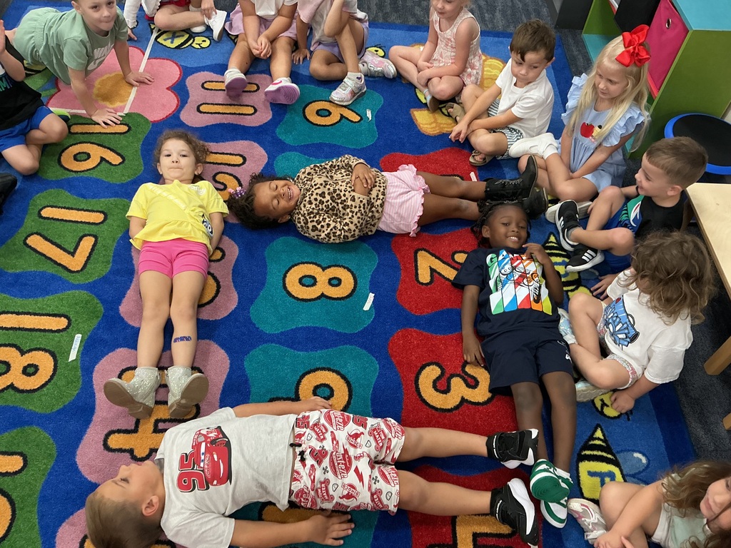 PreK students making shapes with their bodies