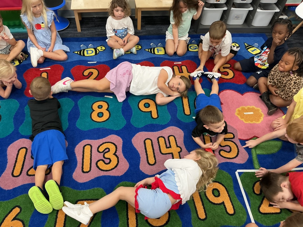 PreK students making shapes with their bodies