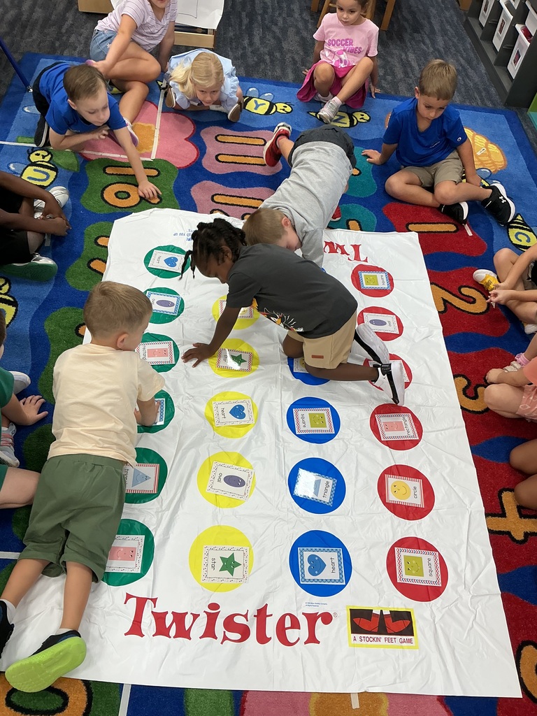 Students playing shape twister