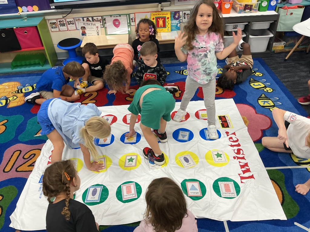 Students playing shape twister
