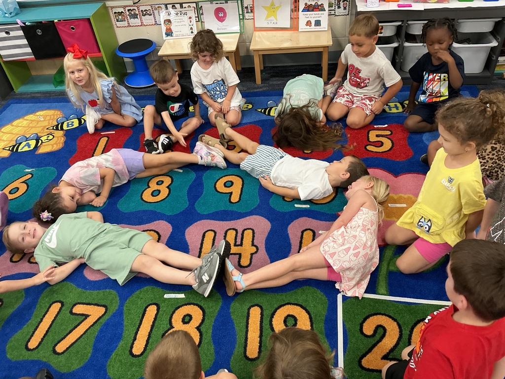 PreK students making shapes with their bodies