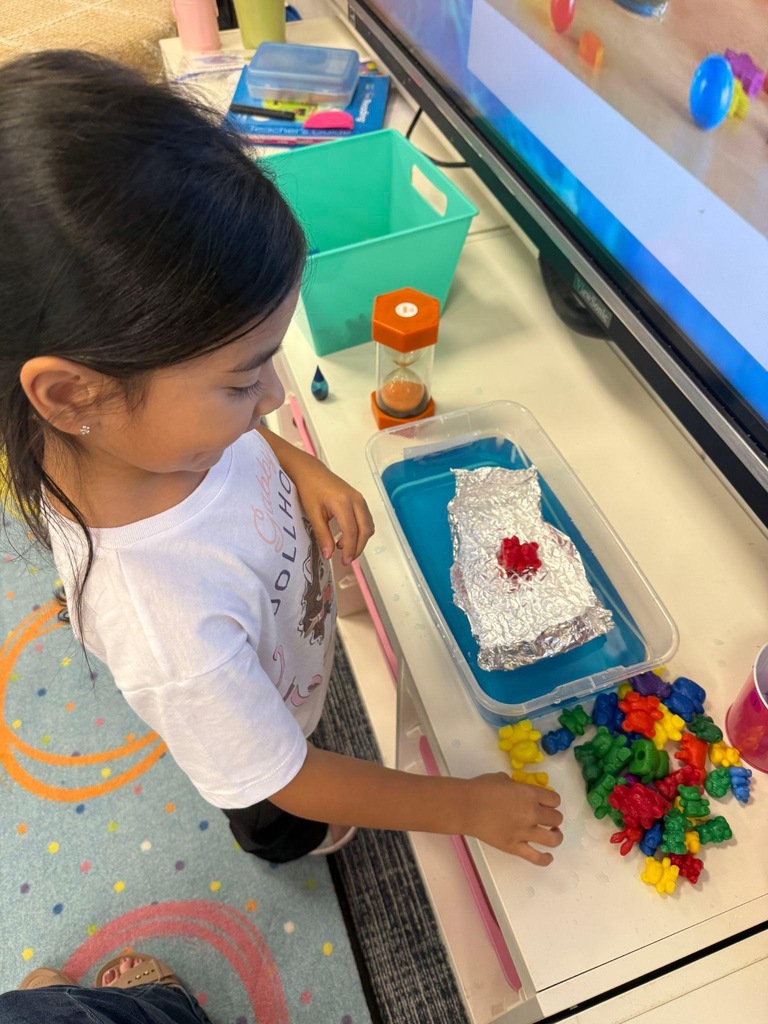 Kindergarteners learning about forces through transportation activities.