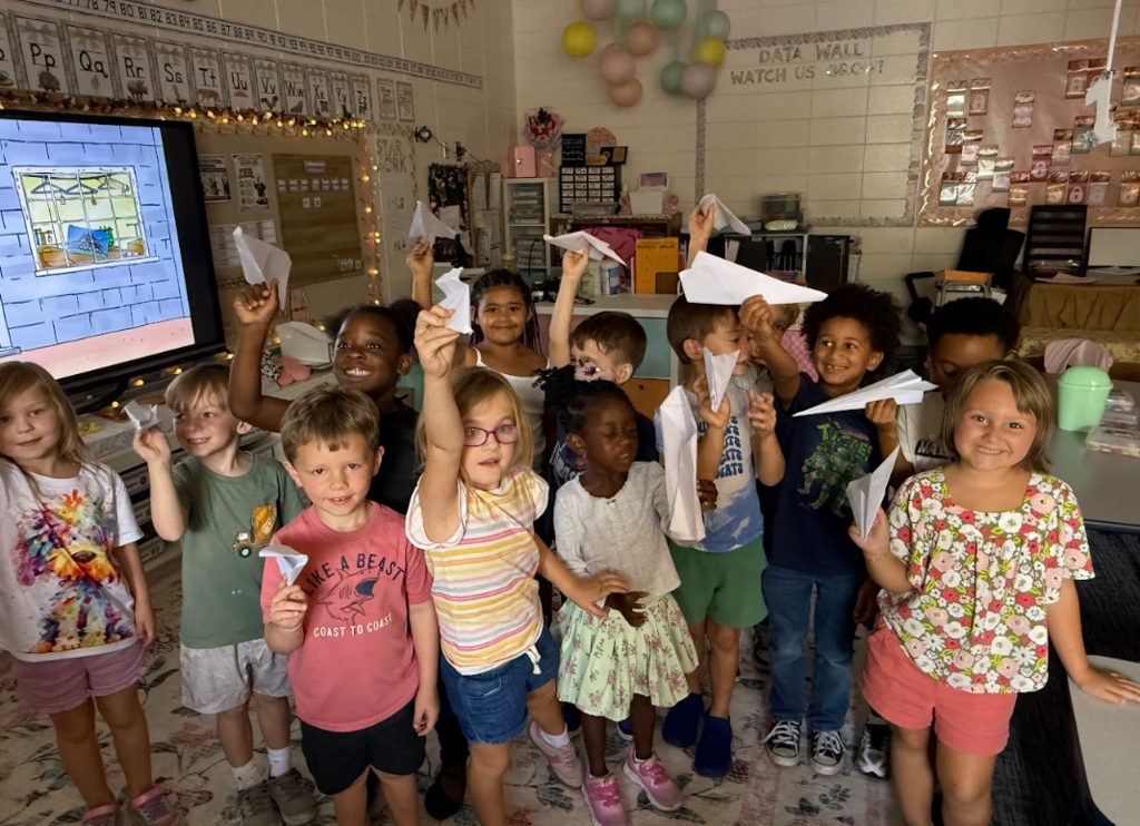 Kindergarteners learning about forces through transportation activities.