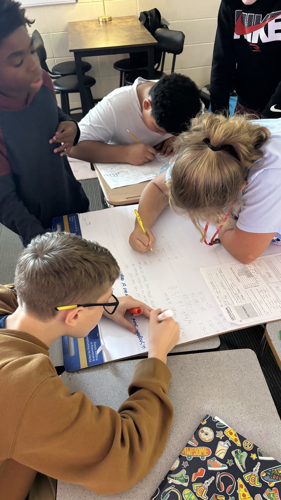 Students creating anchor charts