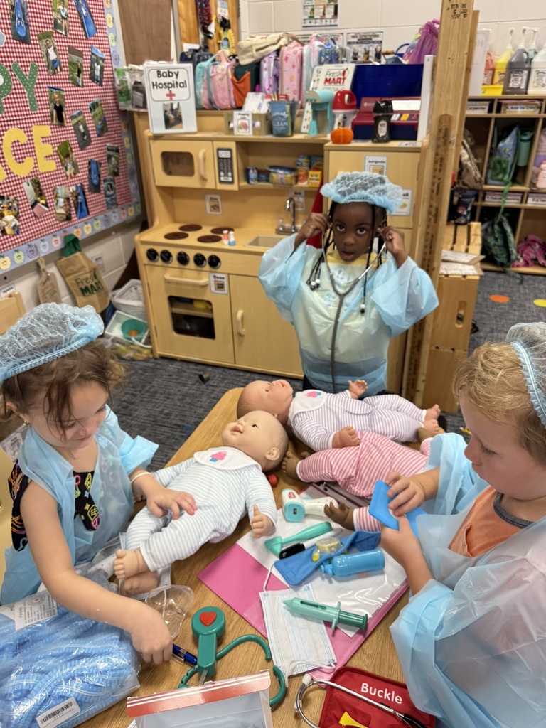 Mrs. Williams' Pre-K class explored community helpers this week through hands-on dress-up and medical play designed to strengthen their fine motor skills.