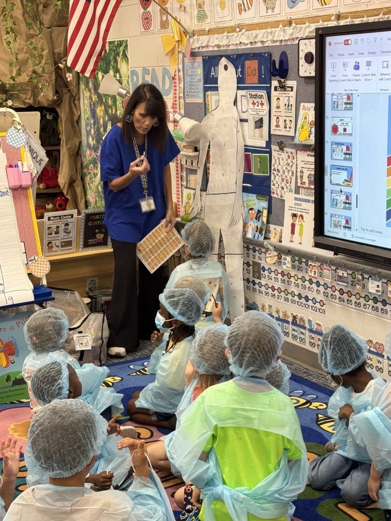 Mrs. Williams' Pre-K class explored community helpers this week through hands-on dress-up and medical play designed to strengthen their fine motor skills.