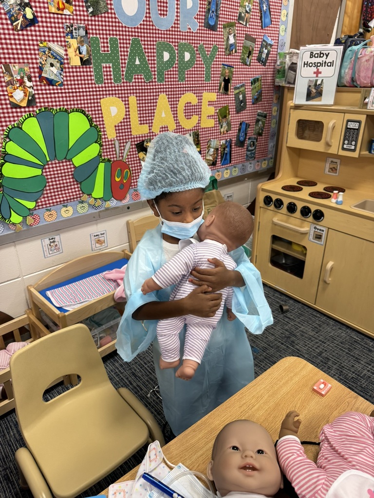 Mrs. Williams' Pre-K class explored community helpers this week through hands-on dress-up and medical play designed to strengthen their fine motor skills.