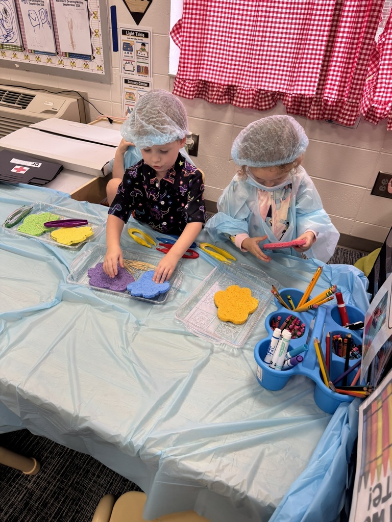 Mrs. Williams' Pre-K class explored community helpers this week through hands-on dress-up and medical play designed to strengthen their fine motor skills.