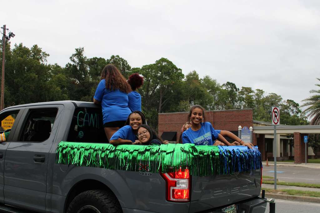volleyball team in the homecoming parad