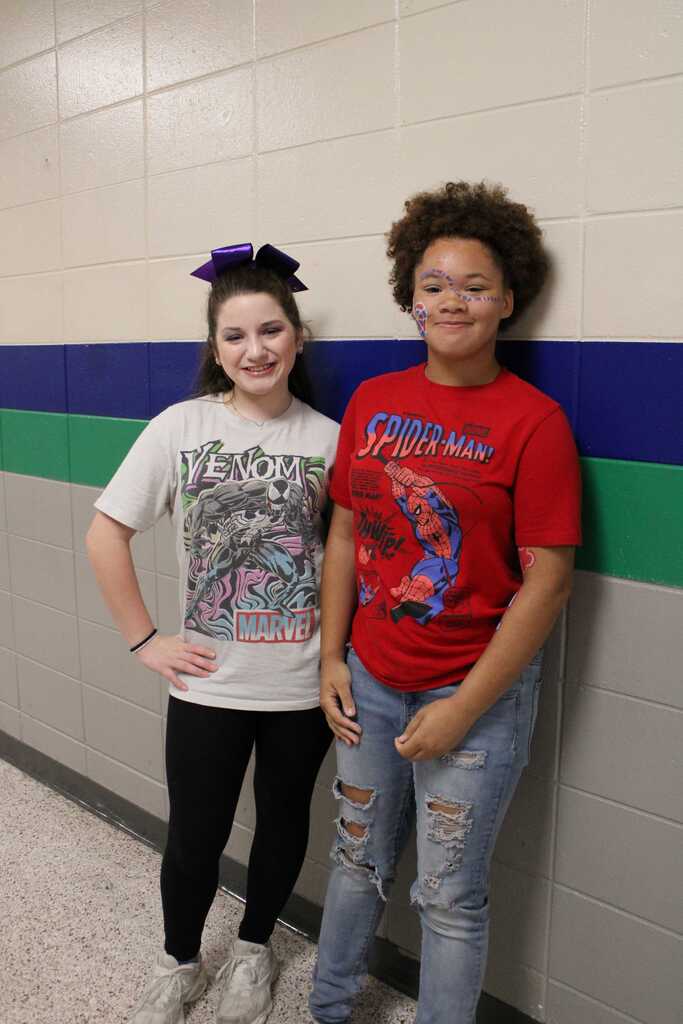 Students with comic book character shirts