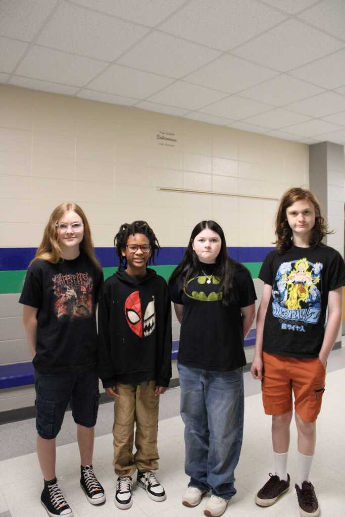 Students with comic and super hero shirts