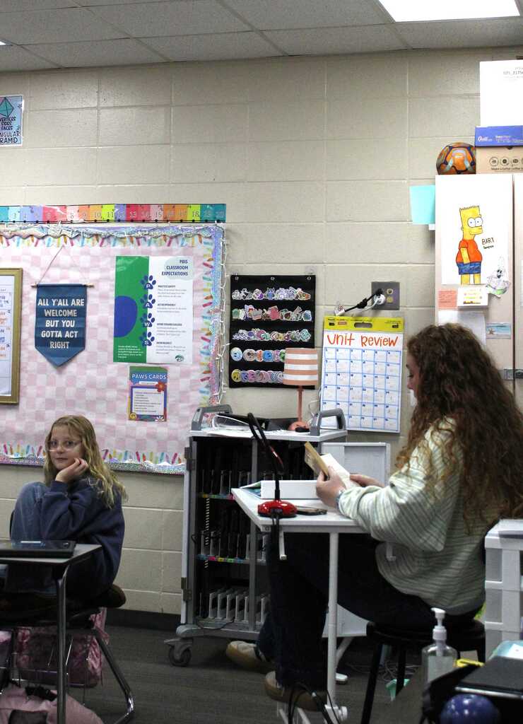 Teacher reading to class