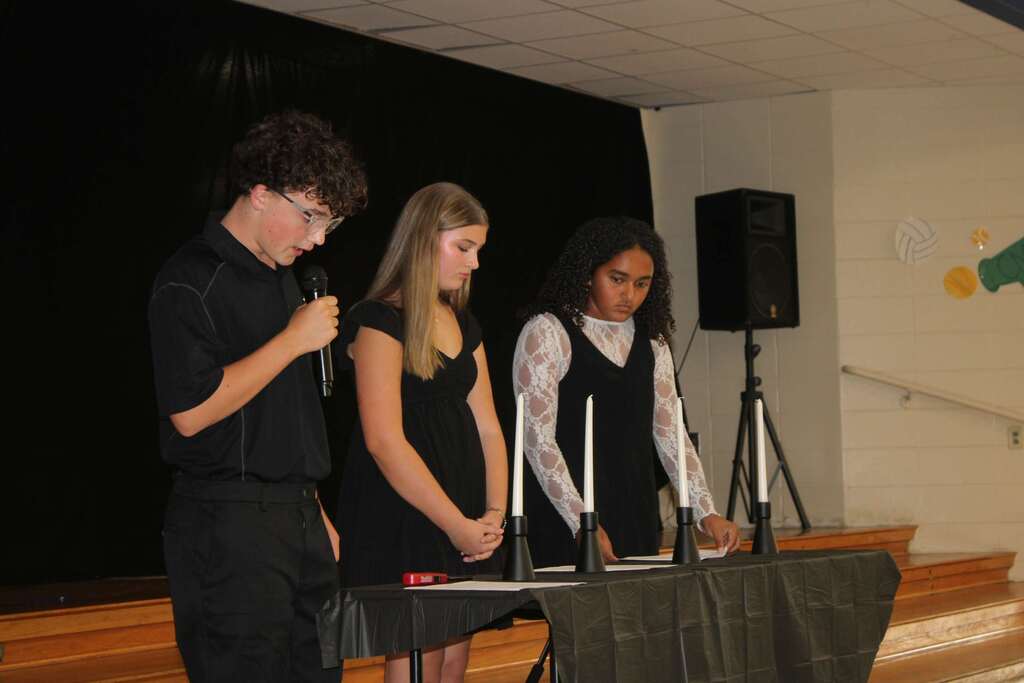 Jr Beta officers reading the four pillars
