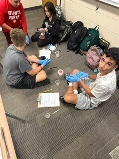 Students extracting strawberry DNA