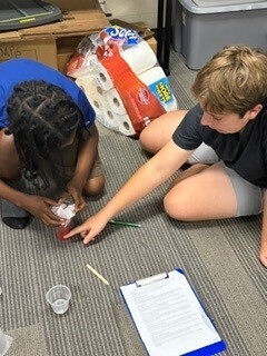 students extracting strawberry DNA