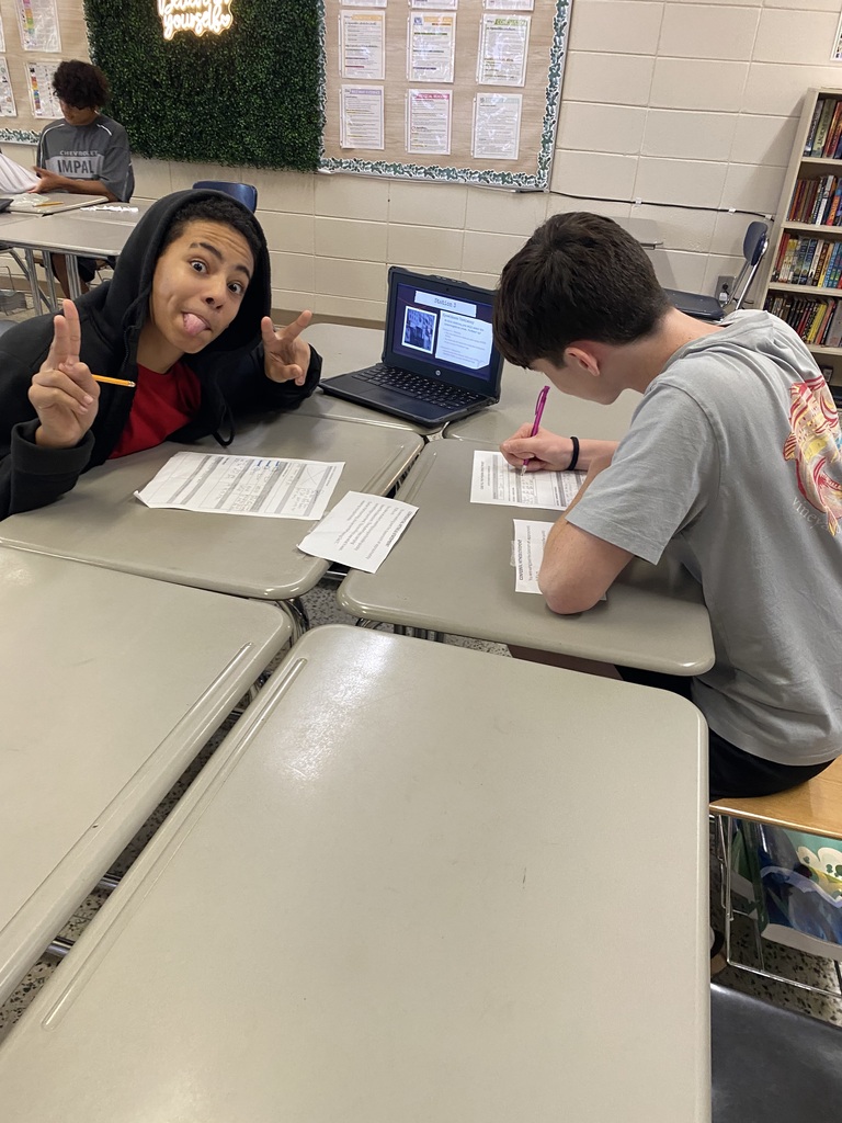 8th grade students working on their argumentative essays.