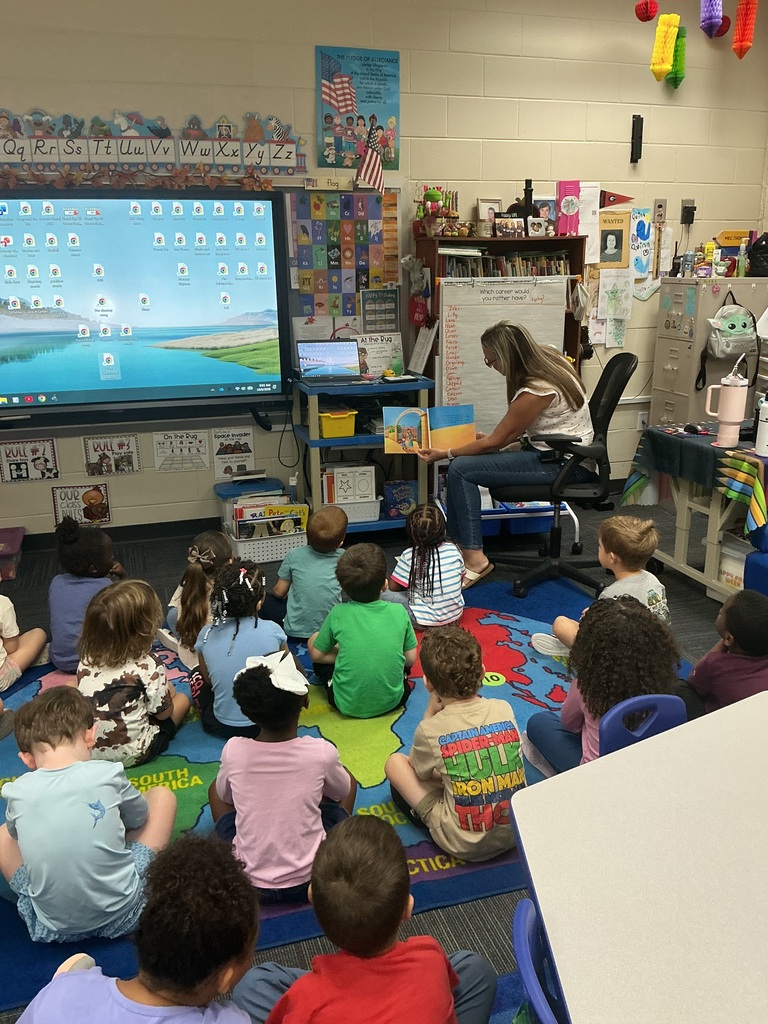Mrs. Swain reading