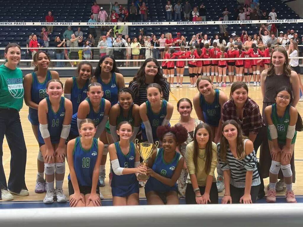 CMS volleyball team and coaches with 2nd place trophy