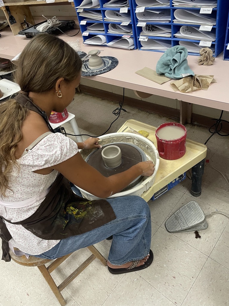 ceramics 2 students throwing pottery