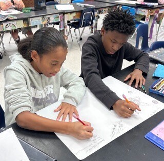 Students working on planet project