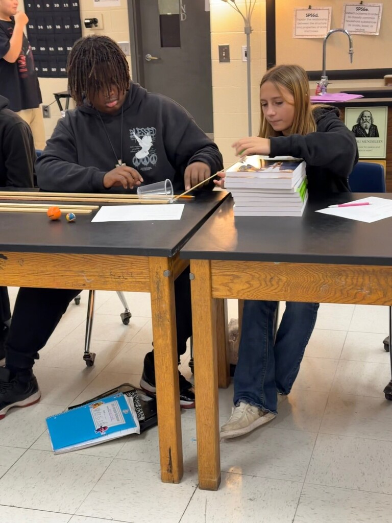 Students working on physical science lab