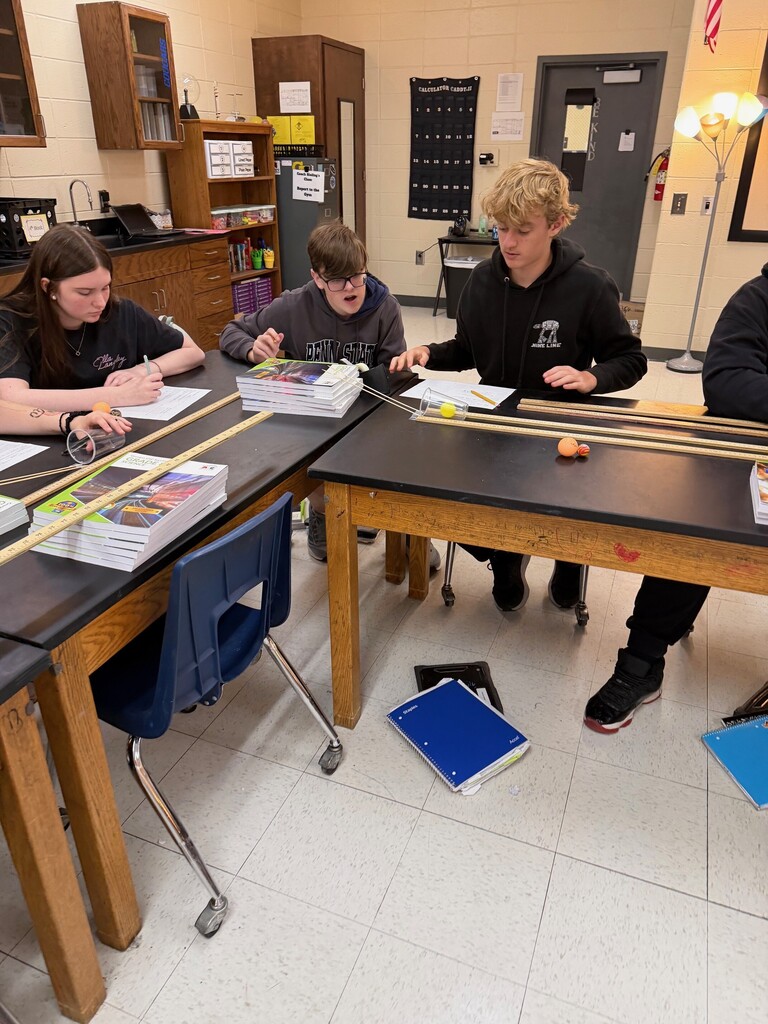 Students working on physical science lab