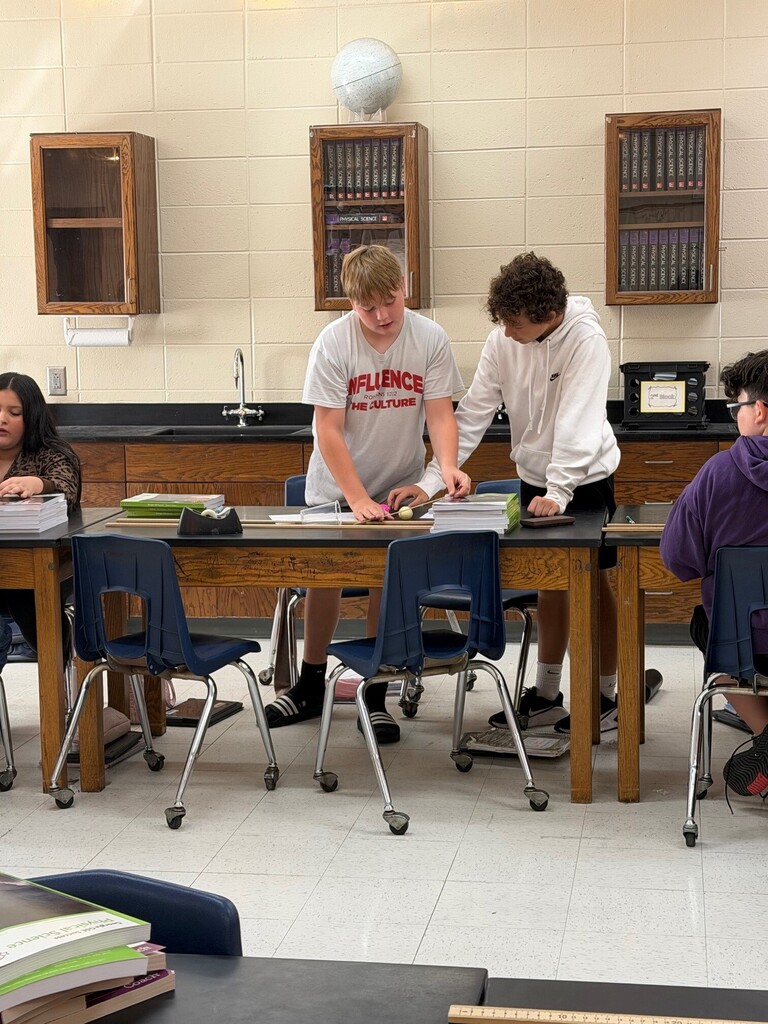 Students working on physical science lab
