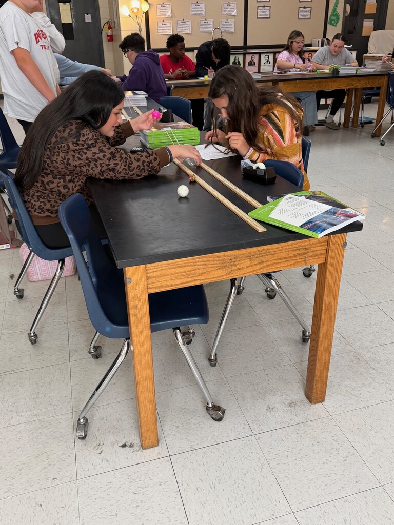 Students working on physical science lab