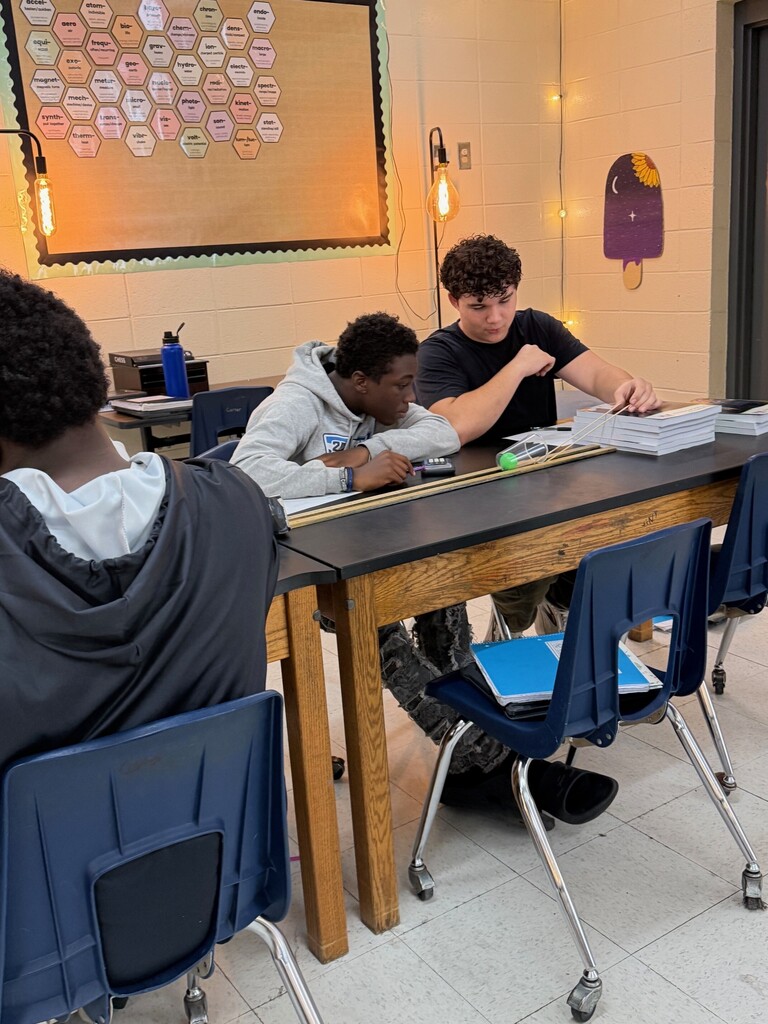 Students working on physical science lab