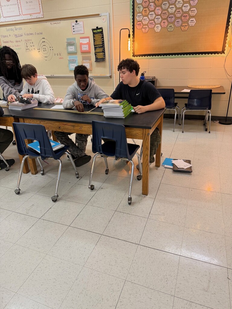 Students working on physical science lab