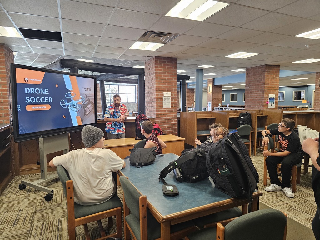 Coach Kapan talking to students about drone soccer