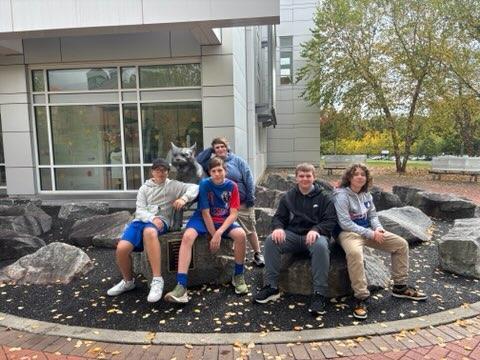 Group photo of students in front of SUNY Polytech