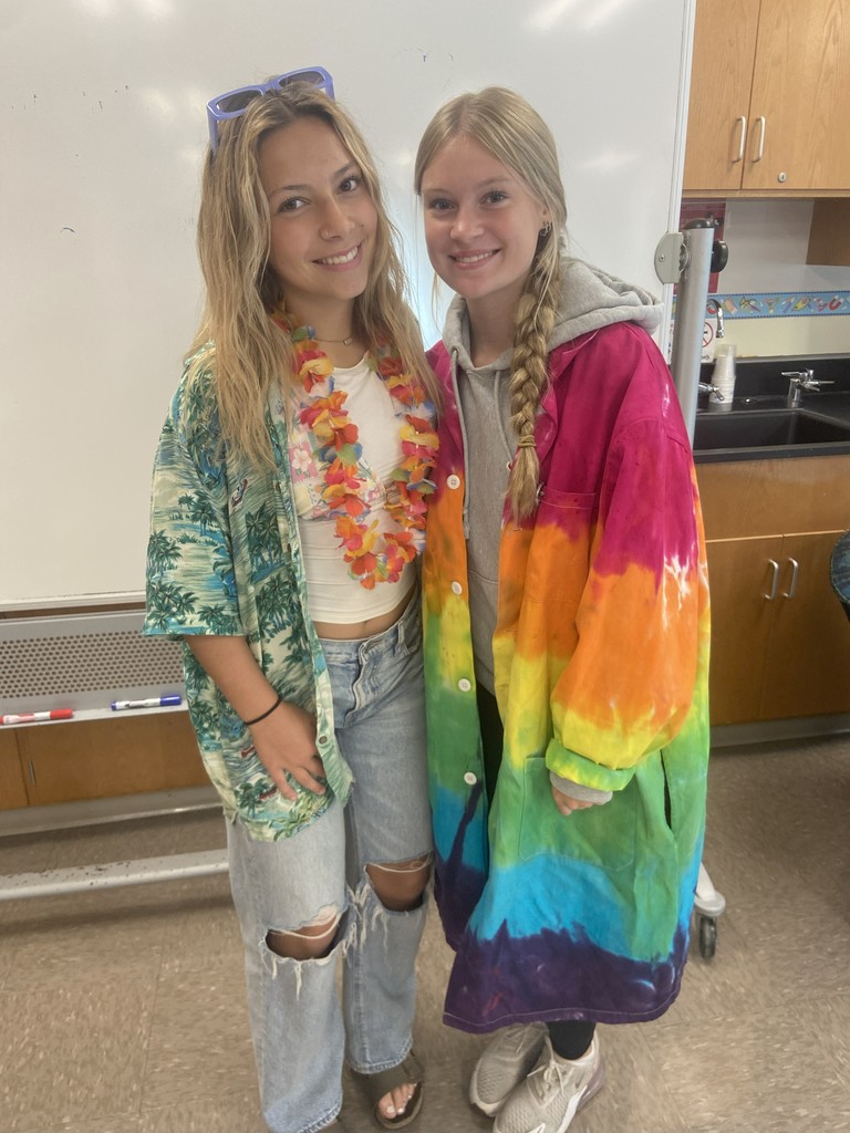 Two students dressed in tie die for spirit week