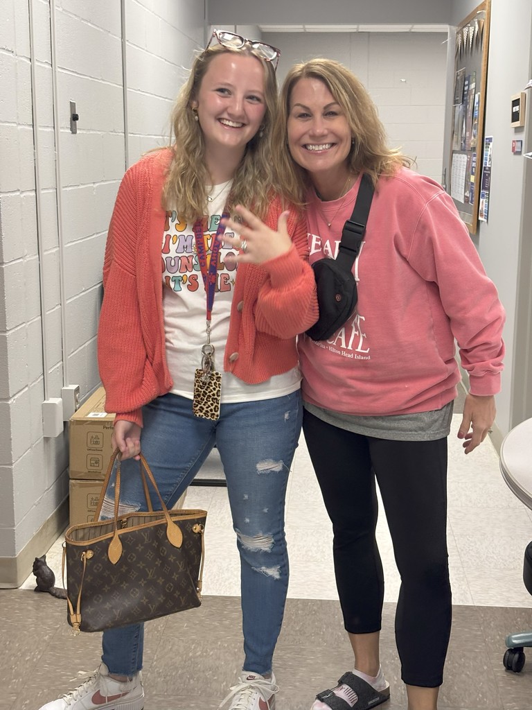 Student dressed up as a school counselor and school counselor dressed up as a student
