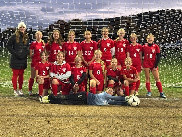 Girls Modified 2025 group picture in red uniforms.